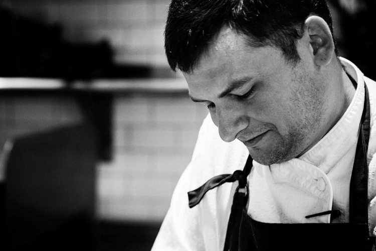 Travis Grimes, chef de cuisine at Husk Restaurant, has lived in Charleston, South Carolina, since he was nine years old. So it&#39;s fitting that he shared his ... - Travis-Grimes-Profile-Photo
