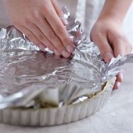 Line the dough with foil