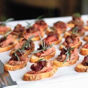 Peppered Beef Tenderloin Crostini with Caramelized Onions