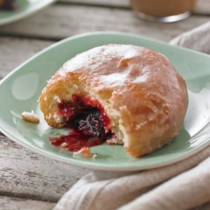 Lemon-Glazed Raspberry Jam Doughnuts