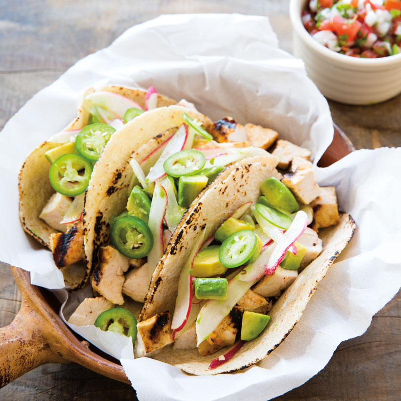 Tequila-Lime Chicken Tacos with Radish-Avocado Salad.