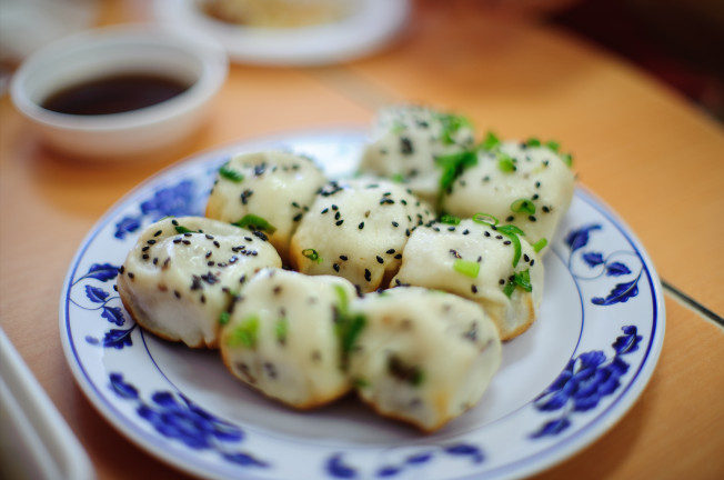 Sheng jian bao from the Kang Kang Food Court. Photo adapted from Jorge Gonzales/Flickr