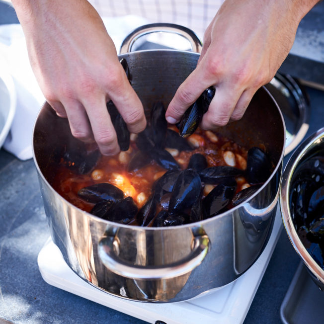 Use the freshest mussels you can find, and discard any that remain closed after cooking.