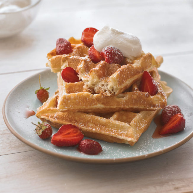 Raised Belgian Waffles with Strawberries and Whipped Cream